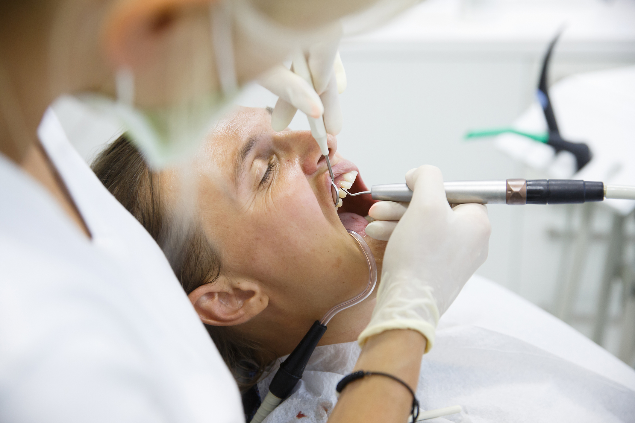 Patient getting their gums checked.